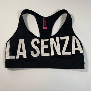 Large La Senza black Racerback sports bra with bold white lettering on front